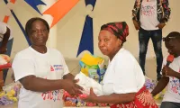 celebration-of-mother-s-day-foxtrot-stands-alongside-the-azito-village-women